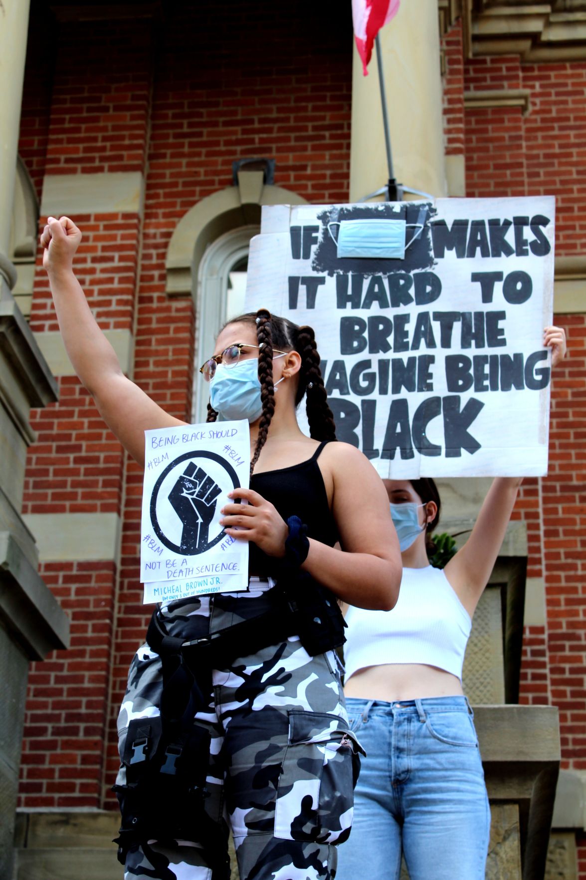"Say their names": Black Lives Matter supporters gather uptown